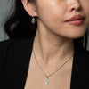 Tiny Cross Necklace with Star Set Stone