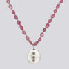 Knotted Pink Sapphire Necklace With Star Set Stone Pendant
