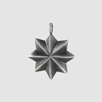 Eight Pointed Black Star Charm