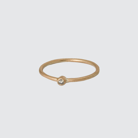 Tiny Bezel Set Diamond Gold Ring